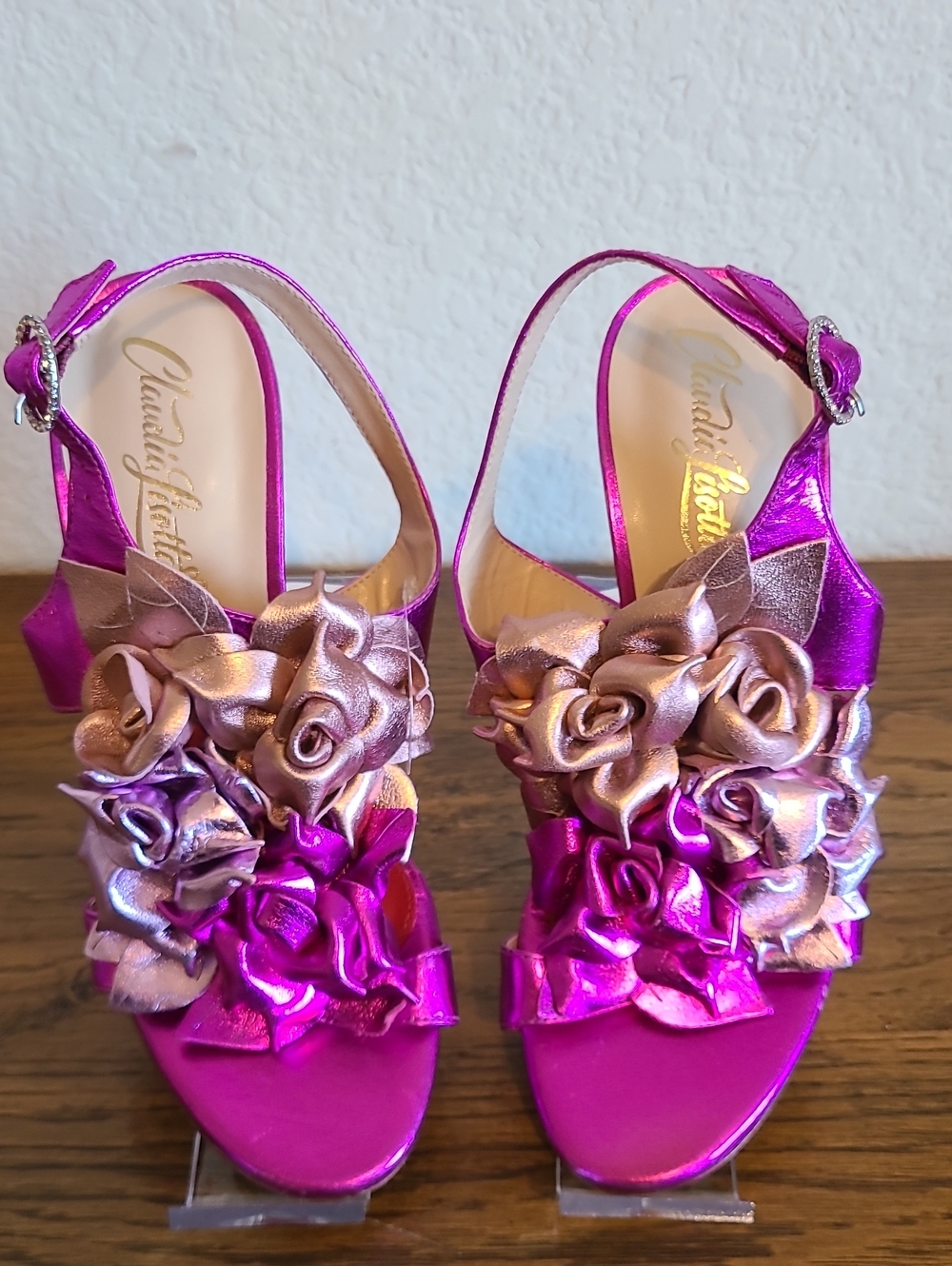 Claudia Lisotta "Tabitha" metallic pink sandals featuring floral appliqués